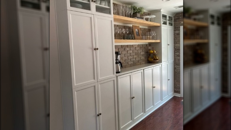 Kitchen with white cupboards