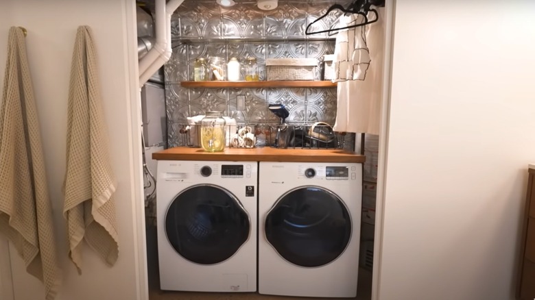 Tile basement laundry room wall