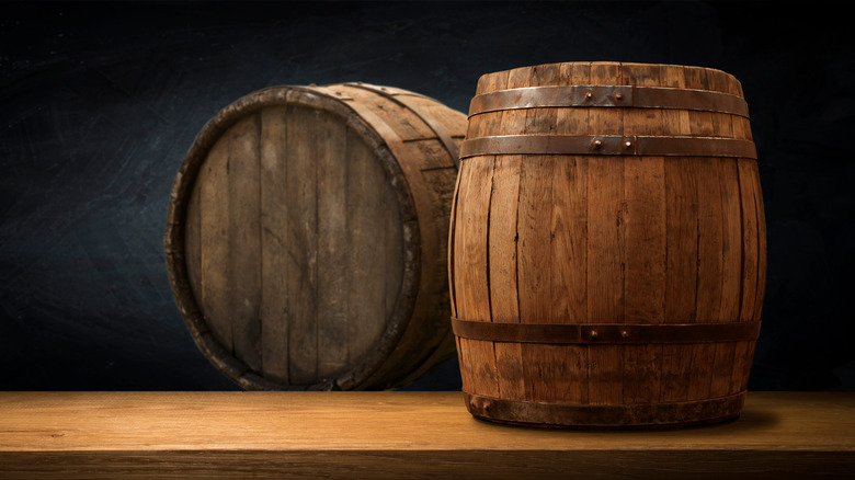 whiskey barrels in a room