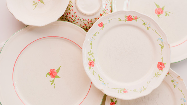 white porcelain plates with floral