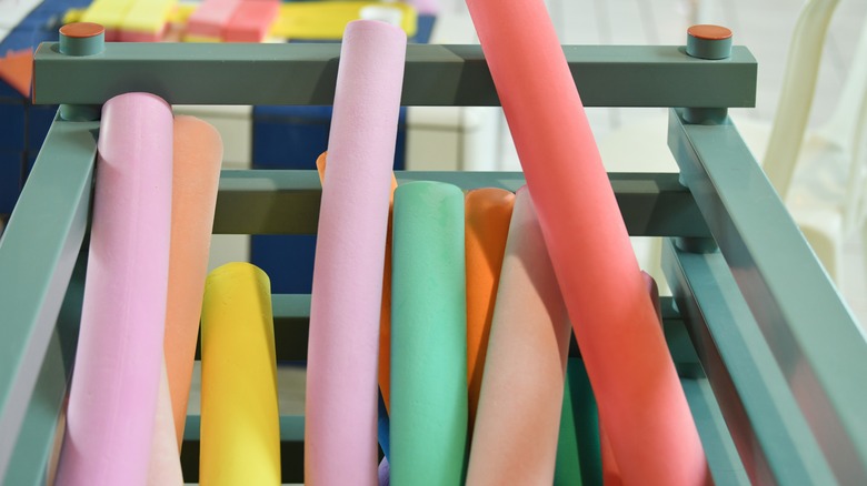 colorful pool noodles in a box