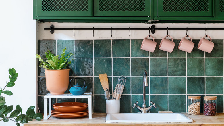 hanging rod above kitchen sink