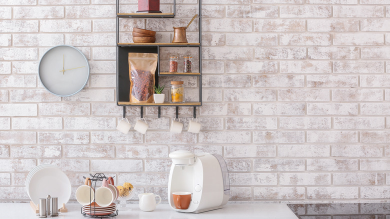 mugs hanging in coffee station