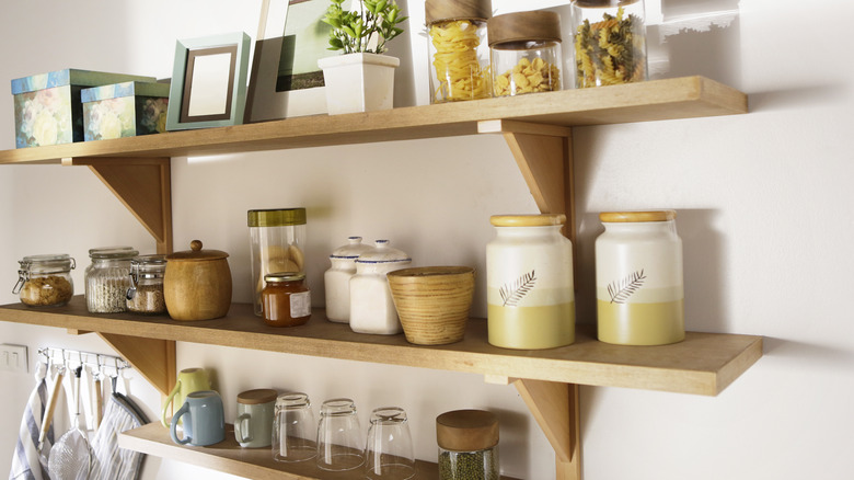 mugs displayed on small shelf