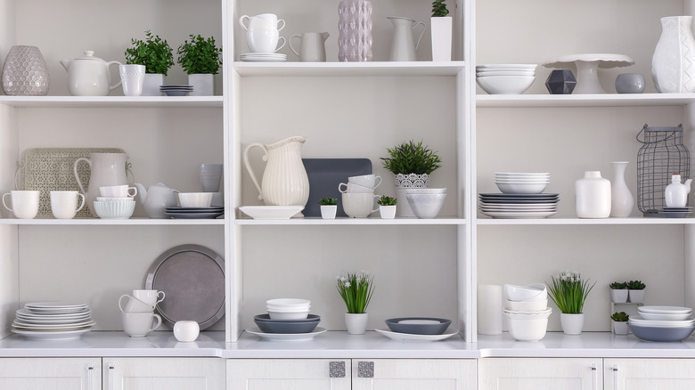 mugs in open cabinet