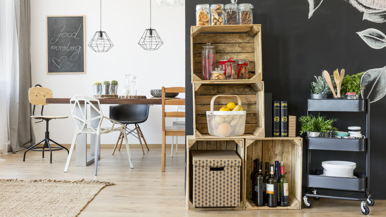 dishes inside black storage cart