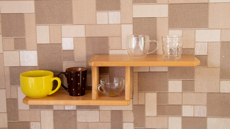 mugs on unique hanging shelf