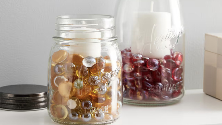 glass gems and tea lights in glass jars