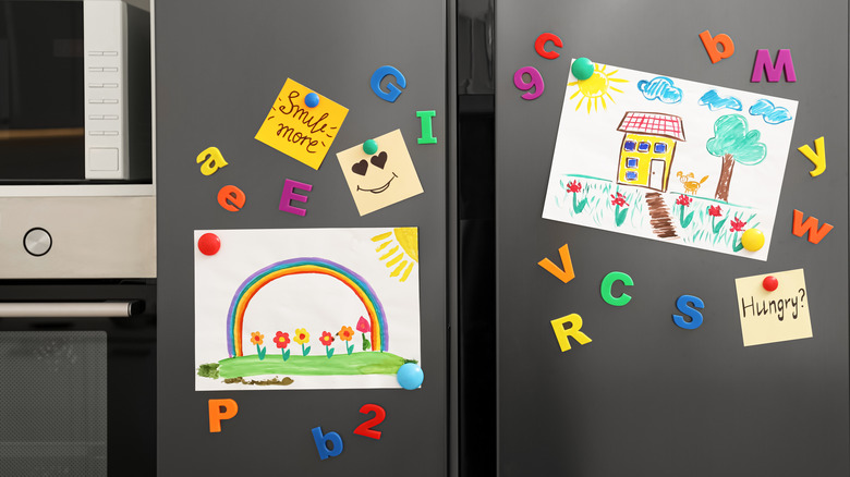 kids artwork on fridge 