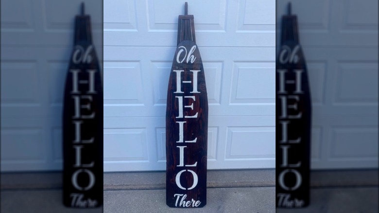 wooden ironing board welcome sign 