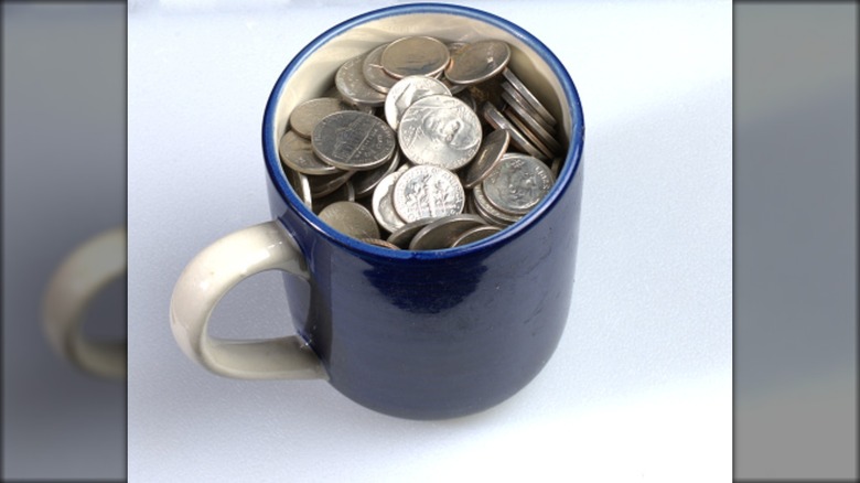 coins in mug