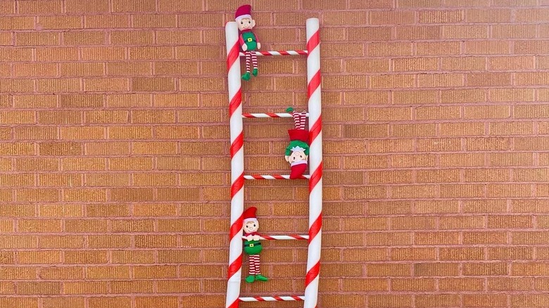 Peppermint ladder with elf dolls