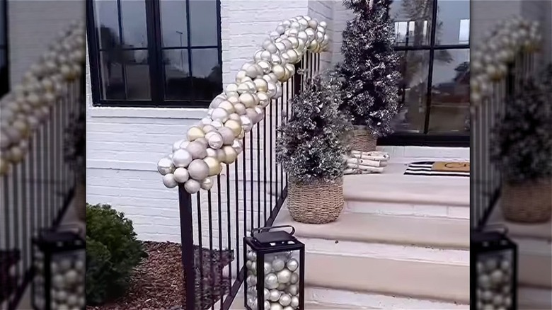 Banister covered in silver ornaments 