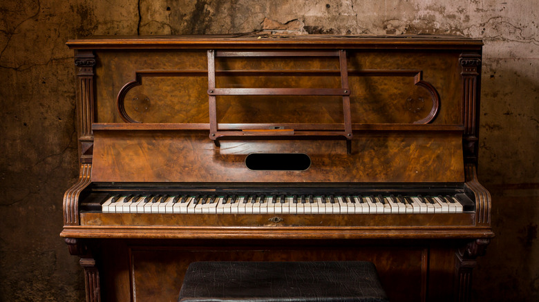 Old wooden upright piano