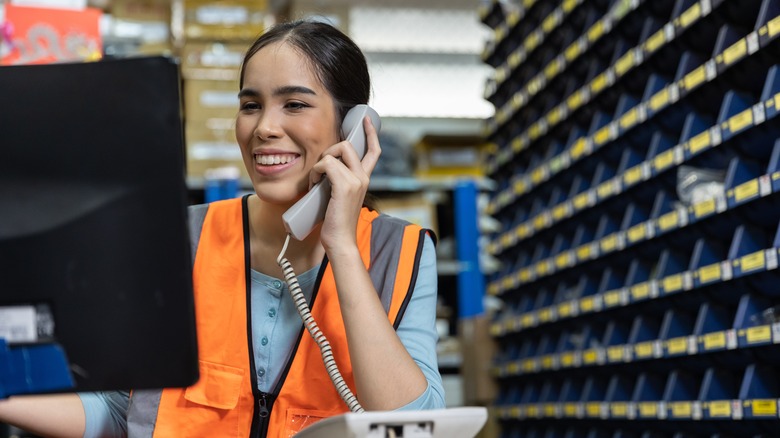 Hardware store employee on phone