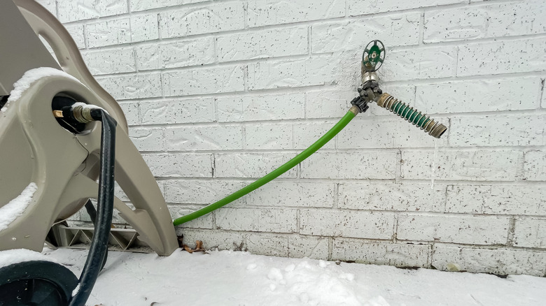 Frozen hose and fitting in snow