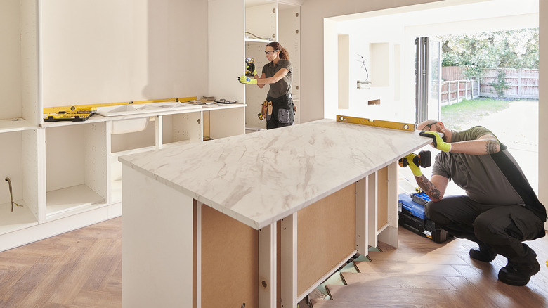 contractors installing countertops