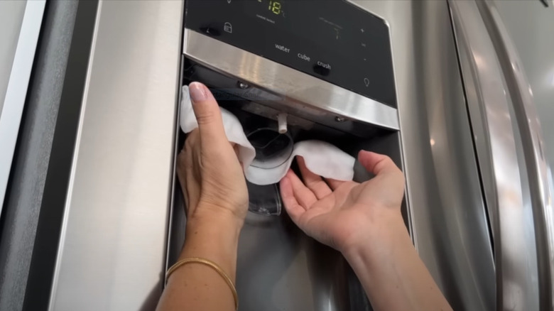 cleaning fridge dispenser nozzle