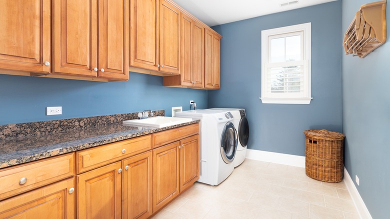 Wood cabinets in laundry room