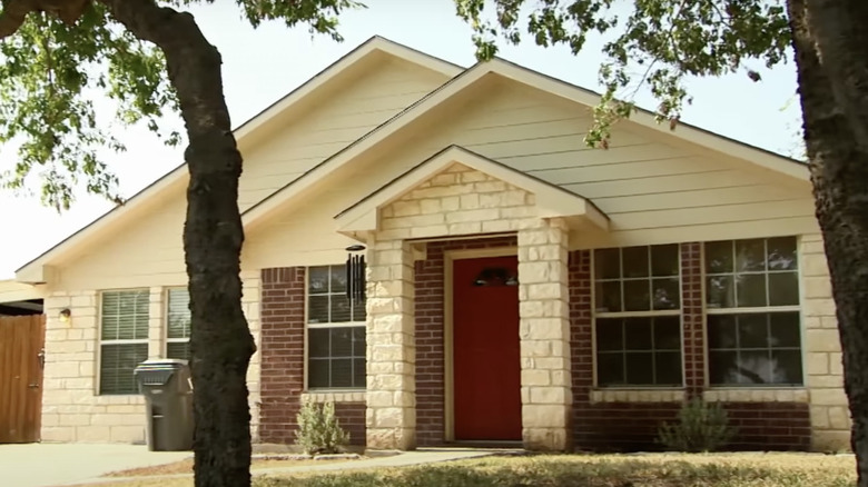 stone house with red door