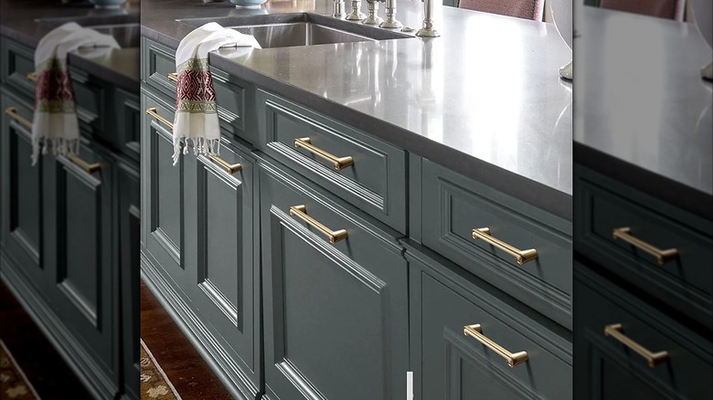 Kitchen cabinets with outdated zinc handles