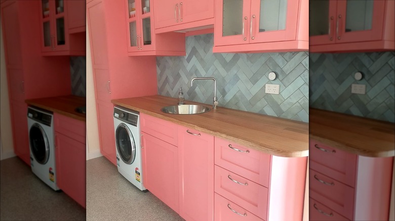 Pink cabinets in laundry room