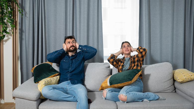 couple dealing with noisy neighbors