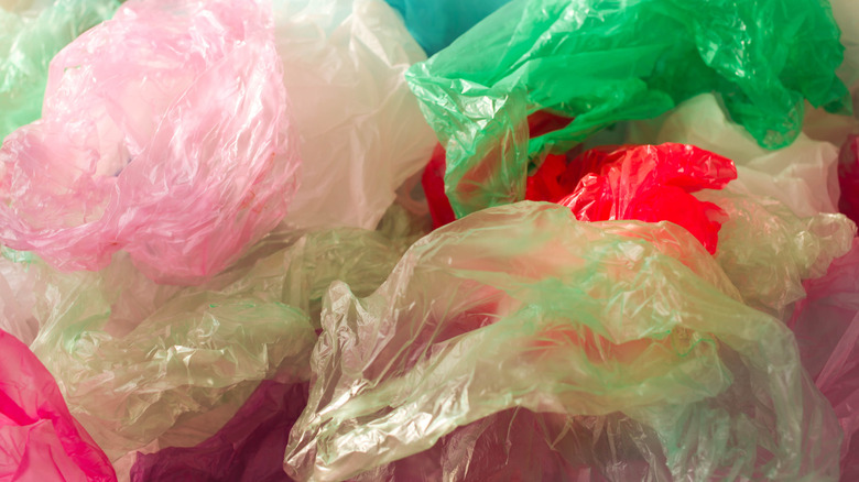 pile of colorful plastic grocery bags