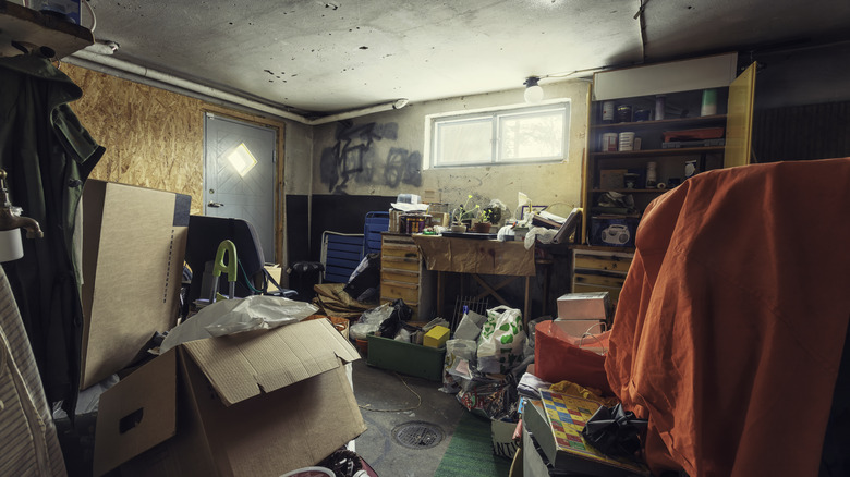 cluttered basement lit up by window