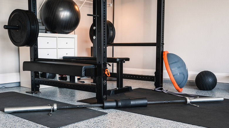 Exercise equipment against wall in garage