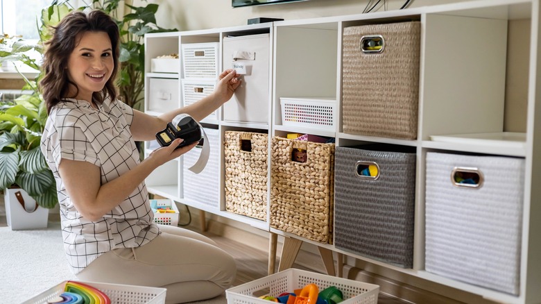 Woman organizing children's toys