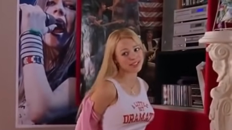 Regina next to Avril poster