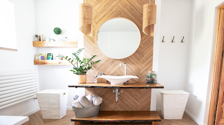 bathroom with wood accent wall