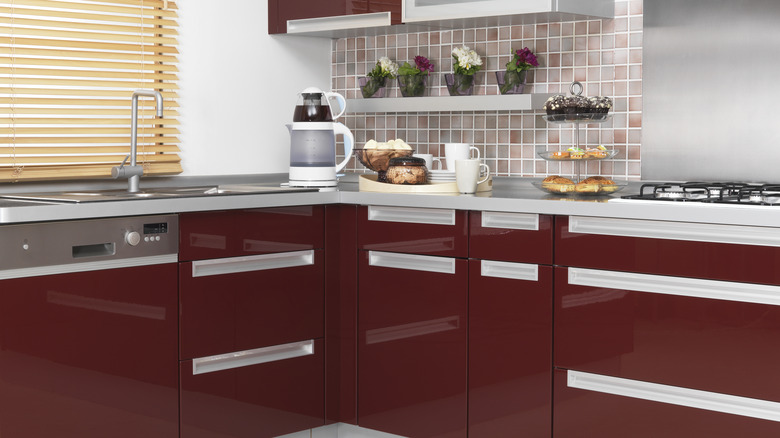 shiny red kitchen cabinets