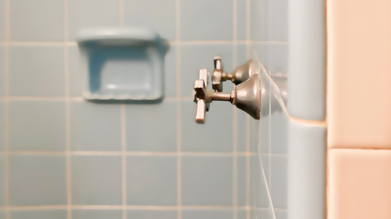 Close up of vintage blue bathroom tiles