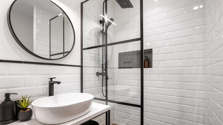 Black and white bathroom with wet room