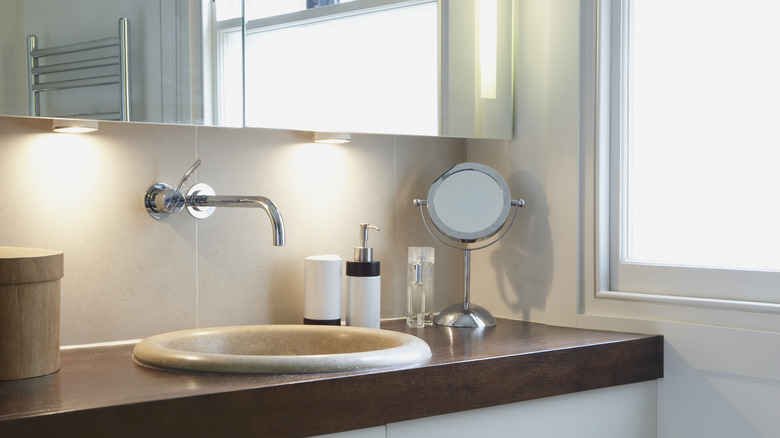 Well-lit bathroom vanity with undercabinet lights