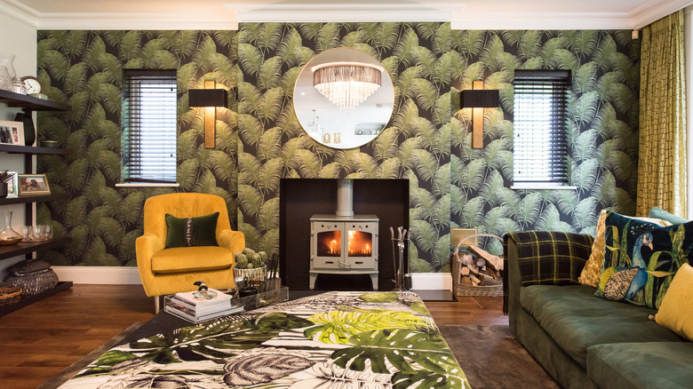 Living room with green botanical wallpaper