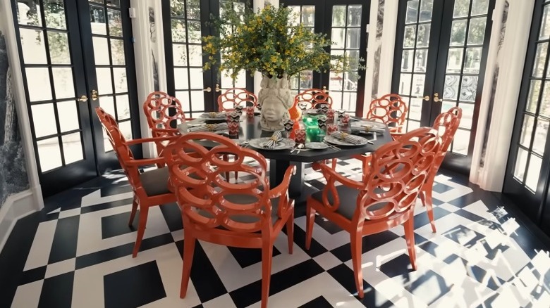 RuPaul's orange loop chairs