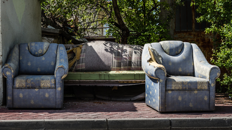 Weather-worn furniture on patio