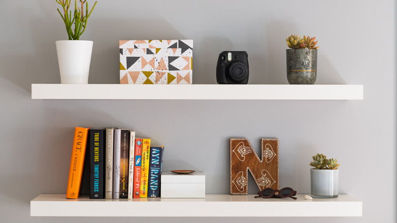 decorative items on floating shelves