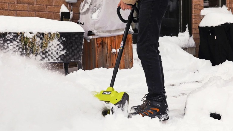 Ryobi snow shovel working in a yard