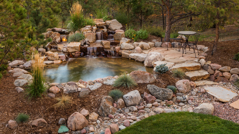 Boulders and pond feature