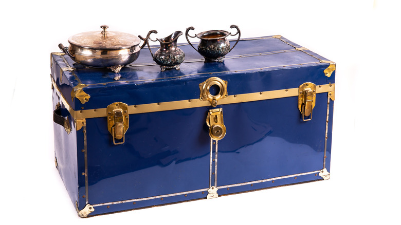 Vintage trunk and silver vessels