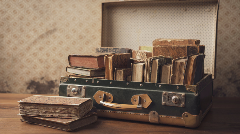 books in suitcase