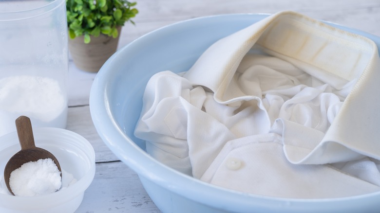 shirt soaking in water bowl