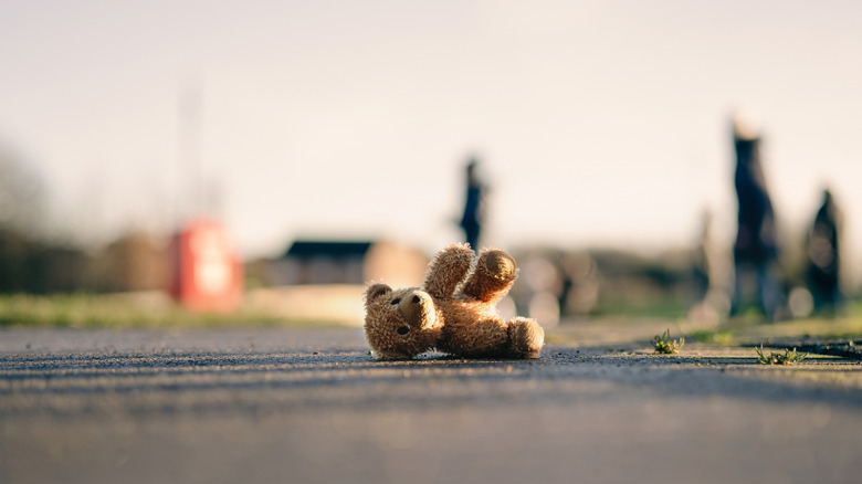 teddy bear in street