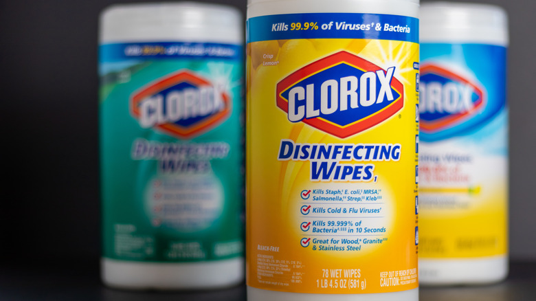 Three Clorox disinfecting wipe containers