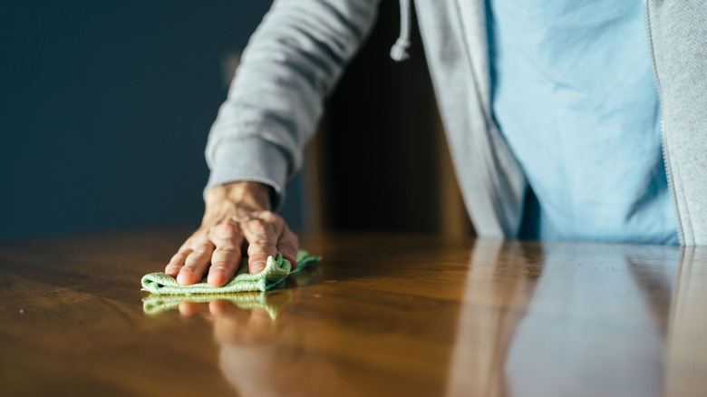 cleaning wooden table