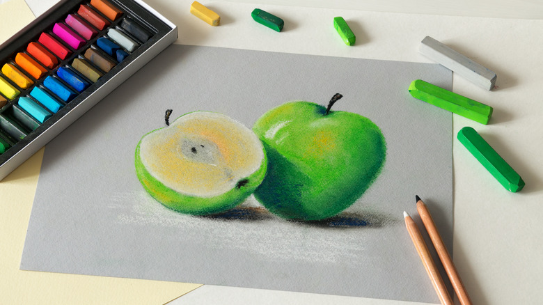 green apple drawn on paper